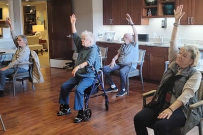 Residents participating in an indoor activity session