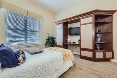 Cozy resident bedroom with a sitting area