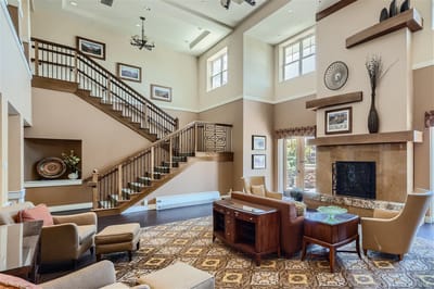 Inviting lounge area with a staircase and seating