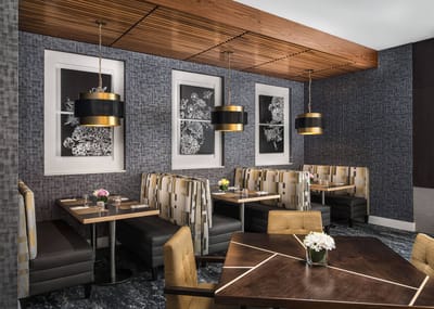 Stylish dining area with booths and modern decor
