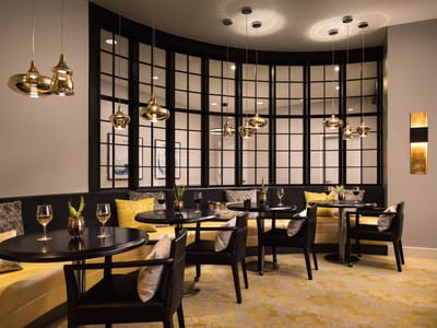 Elegant dining area with modern decor and seating