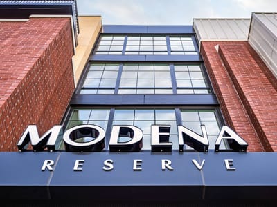 Facility logo displayed on the building exterior