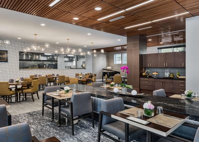 Modern dining area with elegant furnishings and decor