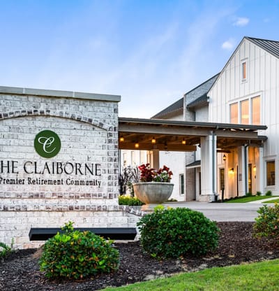 Exterior view of The Claiborne retirement community entrance