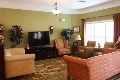 Cozy common area with seating and television