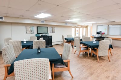 Dining area with tables and chairs set up