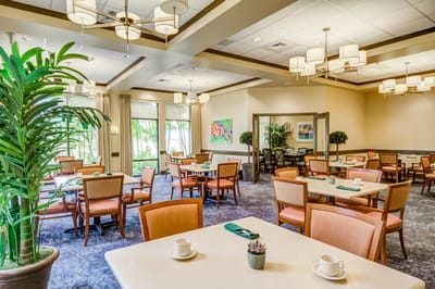 Bright dining room with tables and chairs