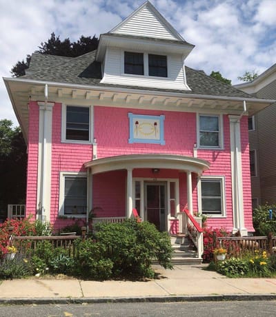 Exterior view of a pink residential building
