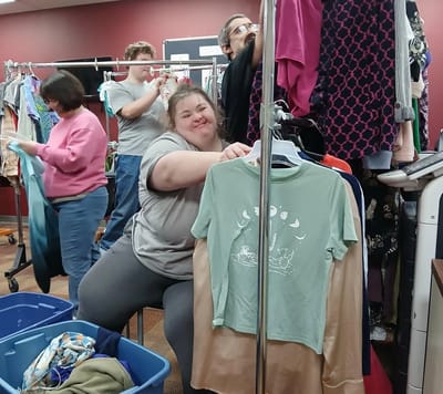 Residents engaged in a clothing donation activity.