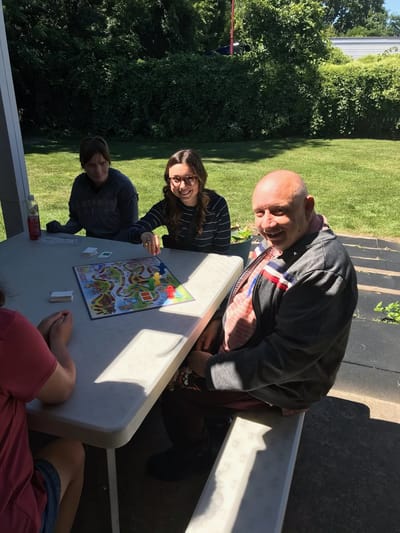 Residents enjoying a game outdoors.