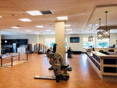 Interior view of a fitness area with equipment.