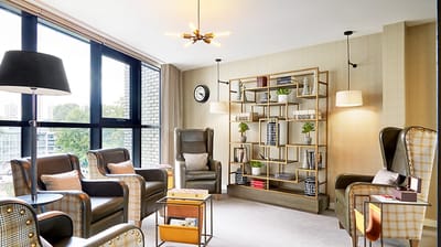 Cozy lounge area with chairs and decor