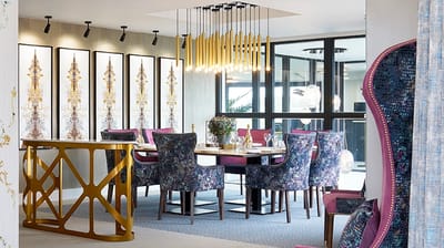 Dining area with modern decor and seating.