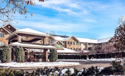 Exterior view of The Lodge at White Bear facility in winter.