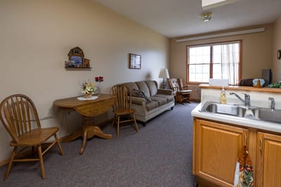 Cozy interior of a resident's room with furniture.