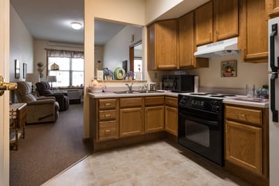 Cozy kitchen area in a resident's suite.