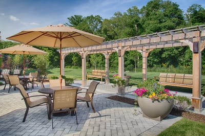 Outdoor patio with seating and umbrellas