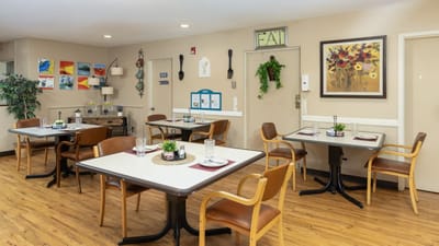 Dining area with tables set for meals