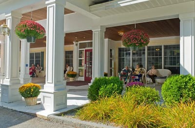 Residents enjoying the outdoor seating area.
