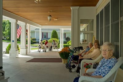 Residents enjoying time on the porch.