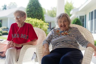 Two residents enjoying the outdoors together.