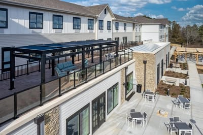Outdoor seating area with patio and views.