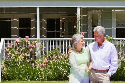 Elderly couple enjoying the outdoor space together.