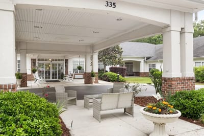Outdoor seating area with decorative plants and seating