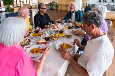Diverse group enjoying a meal together