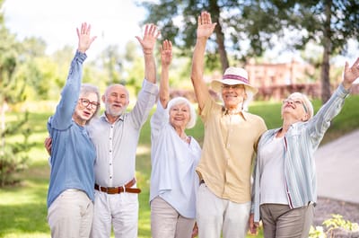 Group of smiling seniors enjoying the outdoors