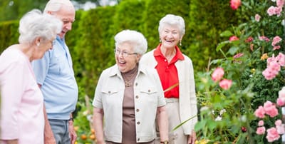 Residents enjoying a garden activity together.