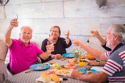 Seniors enjoying a toast at a gathering