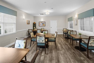 Bright and inviting common area with tables