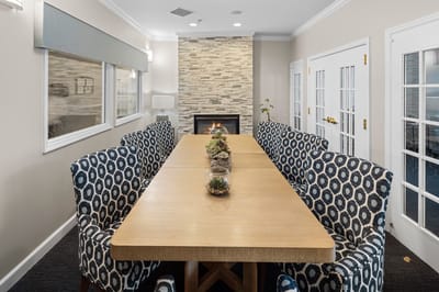 Cozy common area with a large wooden table