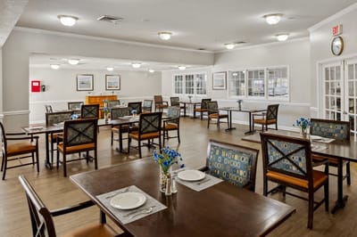 Dining area with tables and chairs set up
