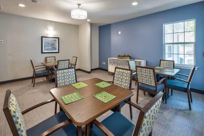 Interior common area with tables and chairs