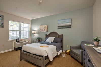 Cozy interior room with a bed and decor.