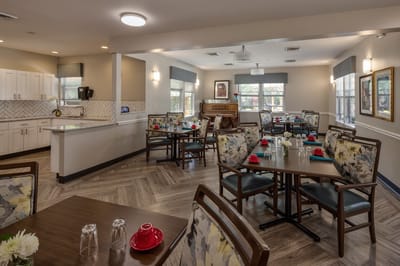 Bright and inviting dining area with tables and chairs