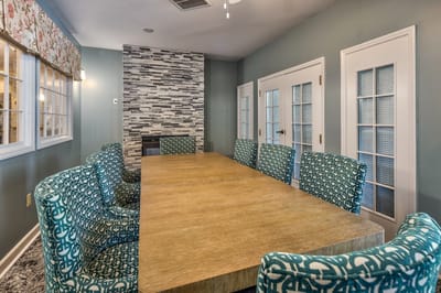 Common area with a large table and chairs.