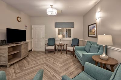 Cozy common area with teal furniture