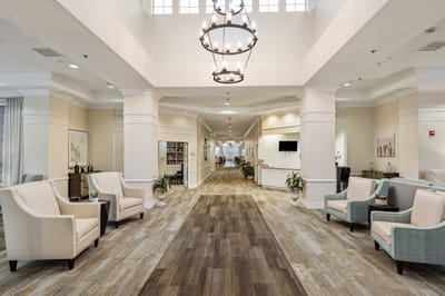 Bright interior lobby with seating and decor