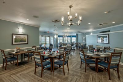 Dining room with tables and chairs arranged