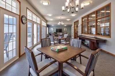 Bright common area with tables and chairs
