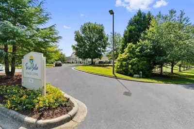 Entrance of TerraBella Northridge with landscaping.