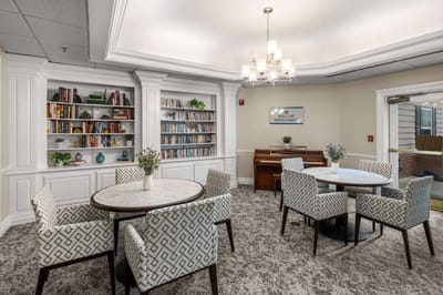 Bright and welcoming common area with bookshelves