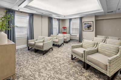 A modern common area with seating arrangements.