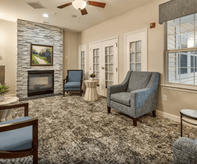 Cozy common area with seating and fireplace