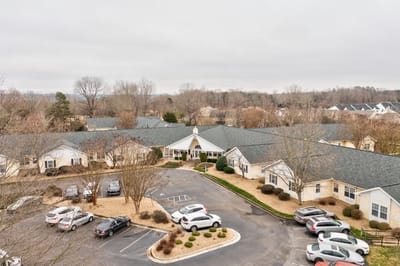 Aerial view of an assisted living facility with parking.