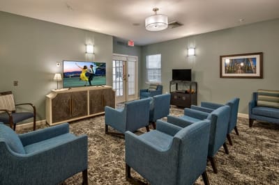 Common area with seating and a television