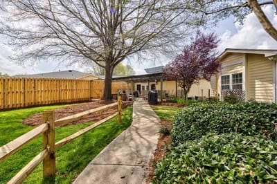 Well-maintained outdoor pathway and garden area
